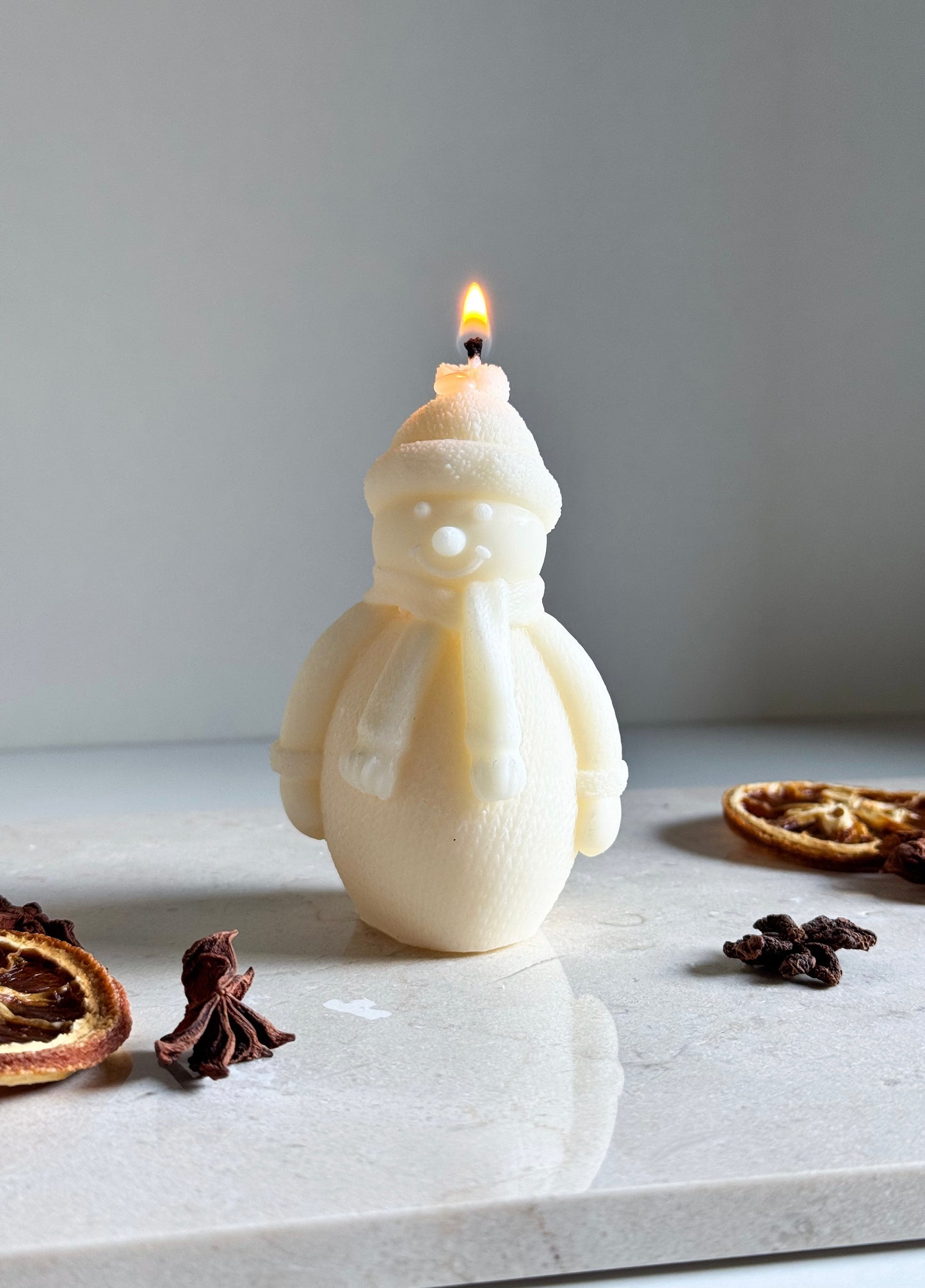 Schneemann Kerze