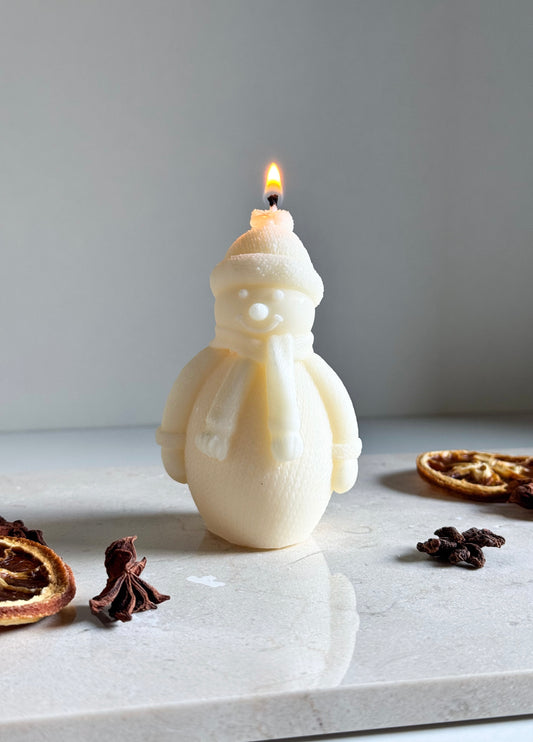 Schneemann Kerze